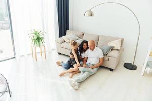 Happy family. Cheerful couple is together indoors photo