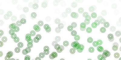 Light green vector doodle background with flowers.