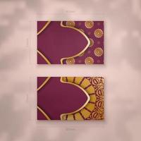 Burgundy business card with Indian gold pattern for your business. vector