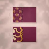 Burgundy business card with abstract gold pattern for your personality. vector