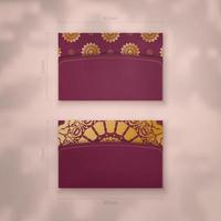 Burgundy business card with luxurious gold ornaments for your personality. vector