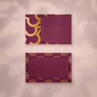 Burgundy business card with abstract gold ornament for your business. vector