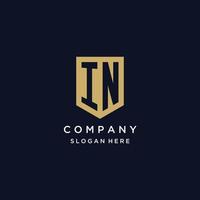 IN monogram initials logo design with shield icon vector