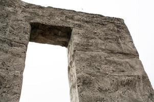 Concrete arch with square lines and a coarse texture photo