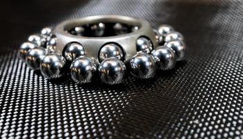 Ball bearings and wheel bearing on carbon fiber cloth photo