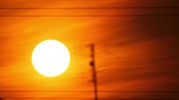 Sunset over village houses roofs, Novosibirsk region video