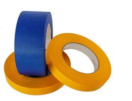 Blue and yellow painters tape rolls photo