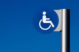 Handicapped sign on a steel post photo