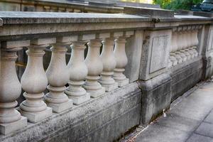 Ornate concrete stone pillar walkway wall photo