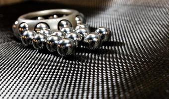 Ball bearings and wheel bearing on carbon fiber cloth 2 photo