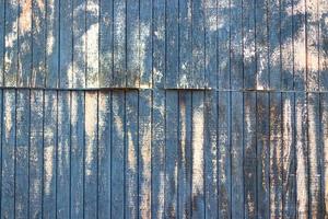 Old distressed painted chipped white wall with lines photo