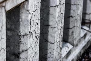 Cracked damaged bridge pillars abstract photo