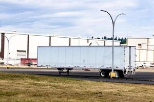 Semi Tractor trailer in parking lot photo