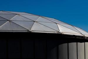 Metal framed domed roof in angled light photo