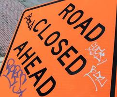 Abstract road closed ahead sign photo