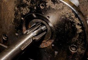 Vintage antique automotive machine shop brake cylinder boring cutter and jig photo