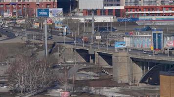 NOVOSIBIRSK, RUSSIA MARCH 29, 2020 - Traffic on Communal Bridge. View of the city of Novosibirsk. video