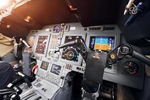 Beautiful sunlight. Close up focused view of airplane cockpit photo