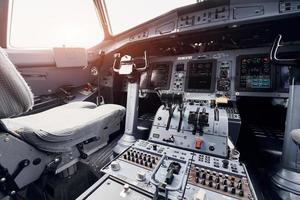 Display with information. Close up focused view of airplane cockpit photo