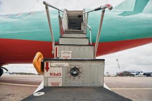 Doors into the small private plane. Parked at daytime photo