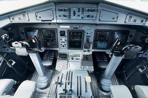 Different displays. Close up focused view of airplane cockpit photo