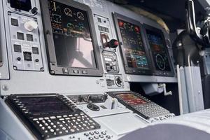 Display with information. Close up focused view of airplane cockpit photo