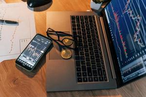 Close up view of phone and laptop. Conception of exchange photo