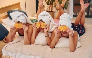 Conception of beauty and spa. Group of happy women that is at a bachelorette party photo