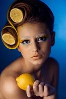 woman with fruit in hair photo