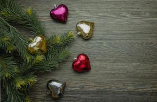 Christmas tree decorations in the form of hearts, Christmas tree toys heart of different colors photo