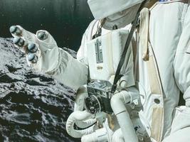 white suit with spacesuit astronaut in space. He has a camera hanging around his neck. on the suit of a tube to ensure the astronaut's breathing photo