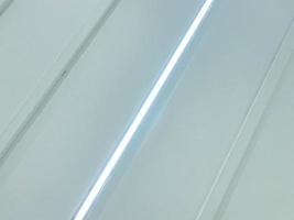 white color texture. plastic material, creating a ceiling and floor, volumetric texture from plastic boxes. ceiling with white light photo
