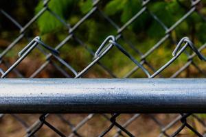 Chain link fence in front of another chain link fence photo