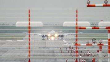 Widebody airplane braking after landing in Dusseldorf Airport video