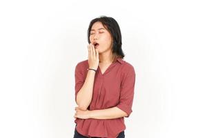 Sleepy and Yawning Of Beautiful Asian Woman Isolated On White Background photo