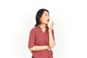 Sleepy and Yawning Of Beautiful Asian Woman Isolated On White Background photo