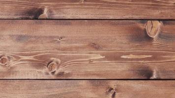 bucle sin interrupción de textura de pared de madera. estructura de tablones de madera. video