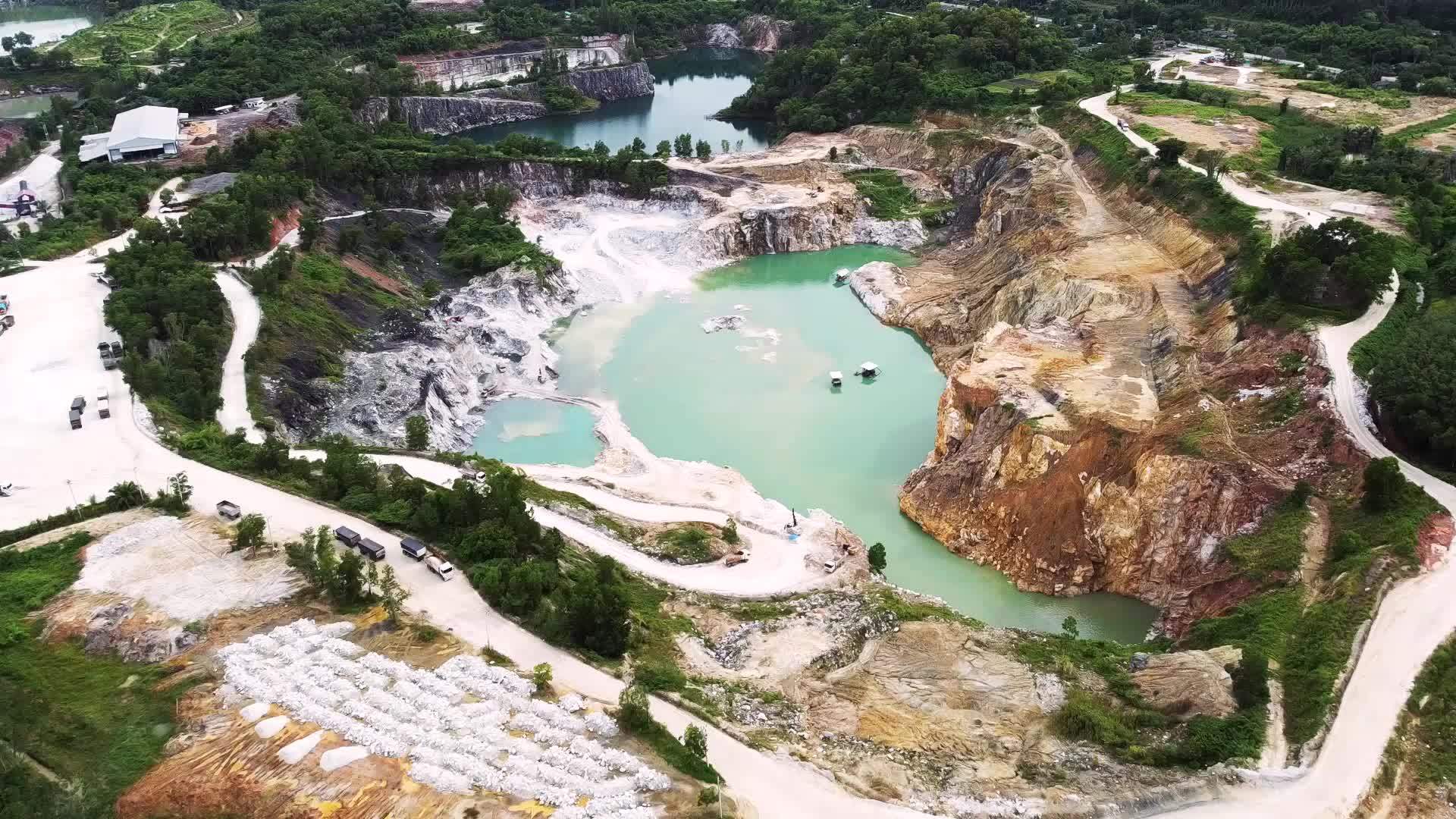 aerial photograph of a large pit of a gypsum mine. A large gypsum mine