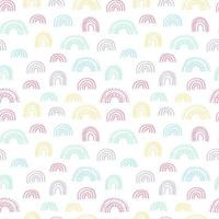 Cute doodle seamless pattern with rainbows. Hand drawn vector rainbow pattern on white backgrownd.