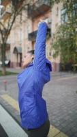 Young woman setting up the fitness smart watch for running. photo