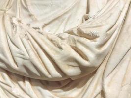 white and voluminous texture, plastic material sculpture, ancient art. on the texture of scuffs, chips, cracks and damage from time to time. 3d volumetric texture, background photo