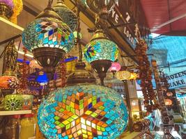 Chinatown. inside are bright, colored, luminous lanterns with a spark and light. glass lantern with stained glass. folk art. chinese lantern photo