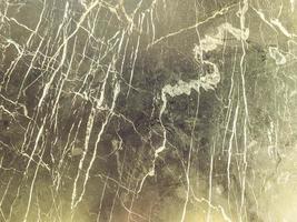 texture, marble of white color on a black background. streaks of white paint on a dark surface. background, texture, 3d abstraction photo