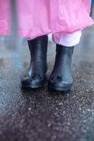 Close up of galoshes on a rainy day photo