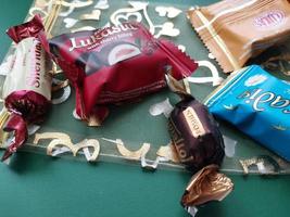 KIEV, UKRAINE - DECEMBER 8, 2022 New Year's sweets on the festive table photo