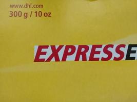 KIEV, UKRAINE - DECEMBER 10, 2022 Mail envelope service DHL photo