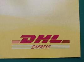 KIEV, UKRAINE - DECEMBER 10, 2022 Mail envelope service DHL photo