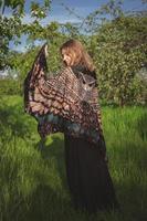 Lady from behind with owl wings shawl scenic photography photo