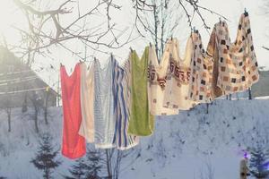 Close up drying clothes in cold weather concept photo