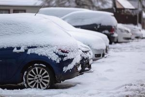 Cars under the snow in winter. Background. Photo. photo